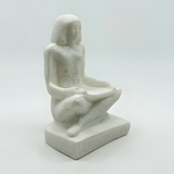 Alabaster seated Egyptian priest museum reproduction statue, additional angle