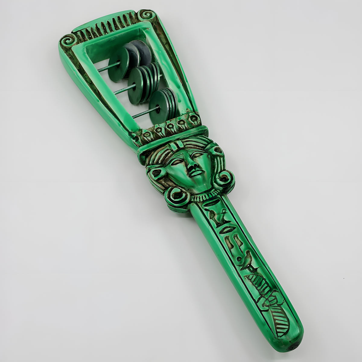 Egyptian sistrum of Hathor with metal rings, museum reproduction — close-up of jingling metal rings