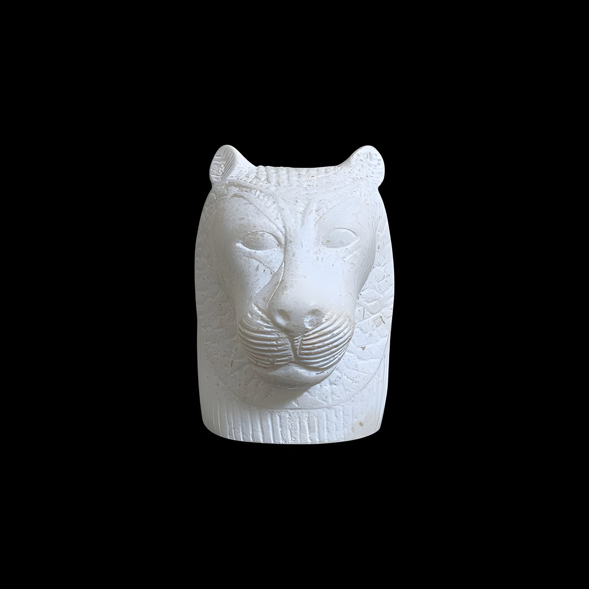 Alabaster Sekhmet bust museum reproduction, close-up of the carved face
