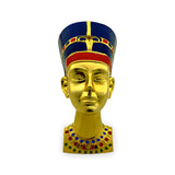 Close-up of the gold-tone Nefertiti bust museum reproduction showing crown and gemstone detail