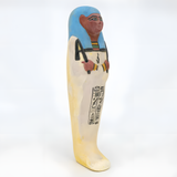 Side view of the limestone ushabti museum reproduction showing carved detail
