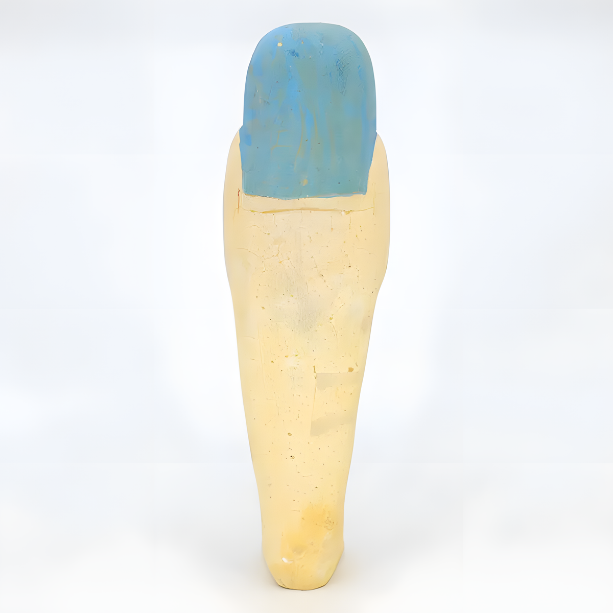 Close-up detail of the limestone ushabti museum reproduction's painted pigment finish
