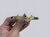 Close-up of the Maat goddess charm on the handmade Egyptian bracelet