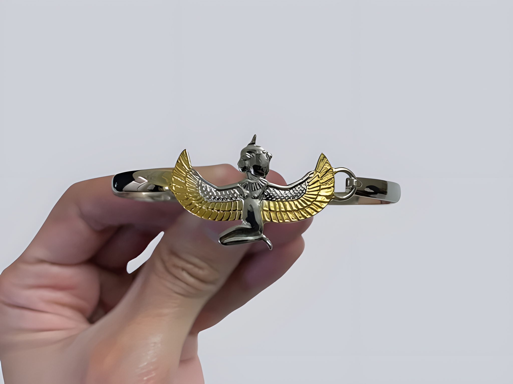 Close-up of the Maat goddess charm on the handmade Egyptian bracelet