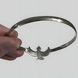 Handmade Egyptian Maat bracelet shown worn on the wrist