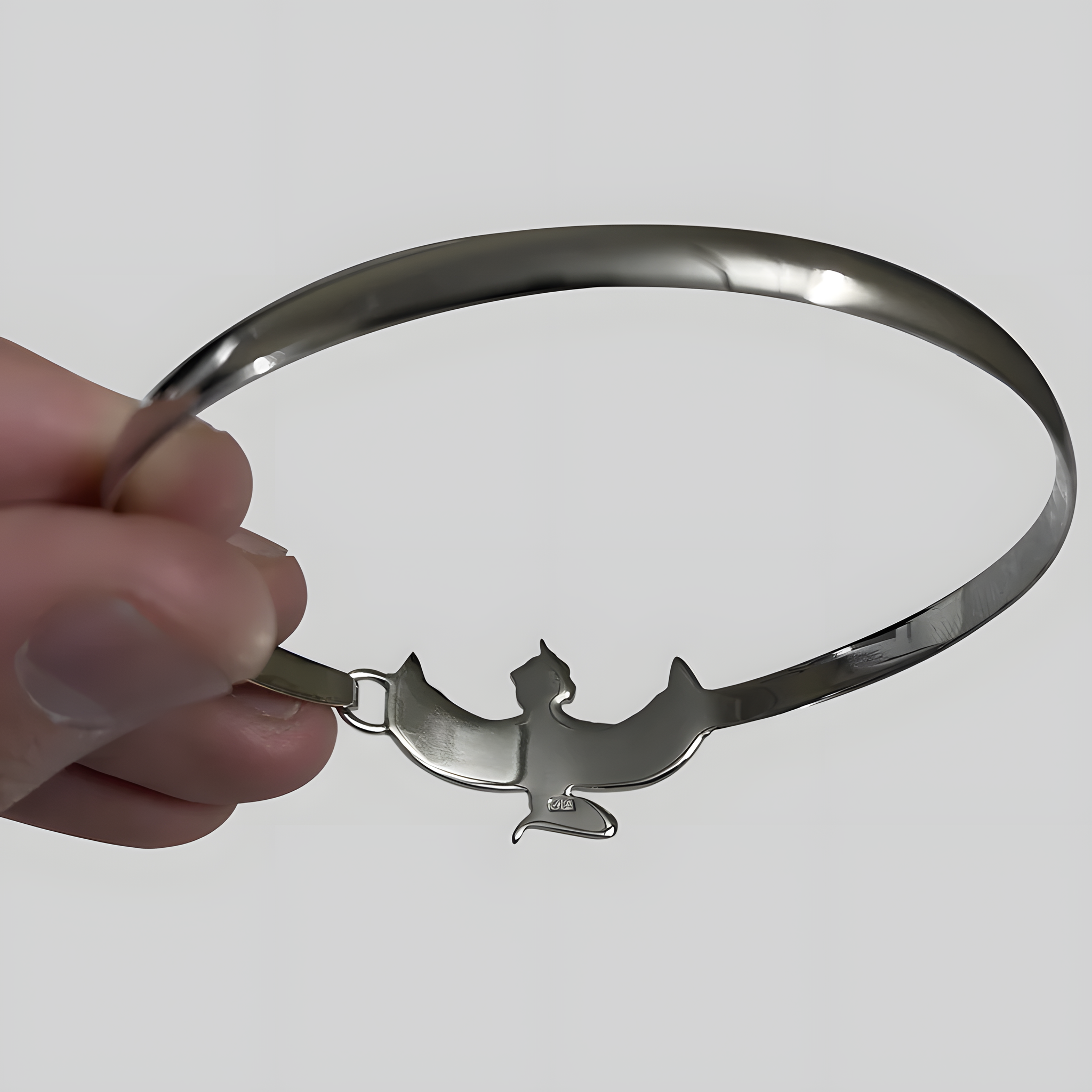 Handmade Egyptian Maat bracelet shown worn on the wrist