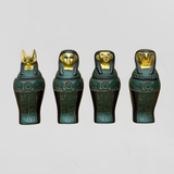 Egyptian winged sun canopic jars set, museum reproduction — full set front view
