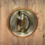 Copper decorative plate depicting a dance scene, hand-engraved wall art, front view