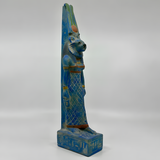 Sekhmet statue in blue stone, museum reproduction, side profile view