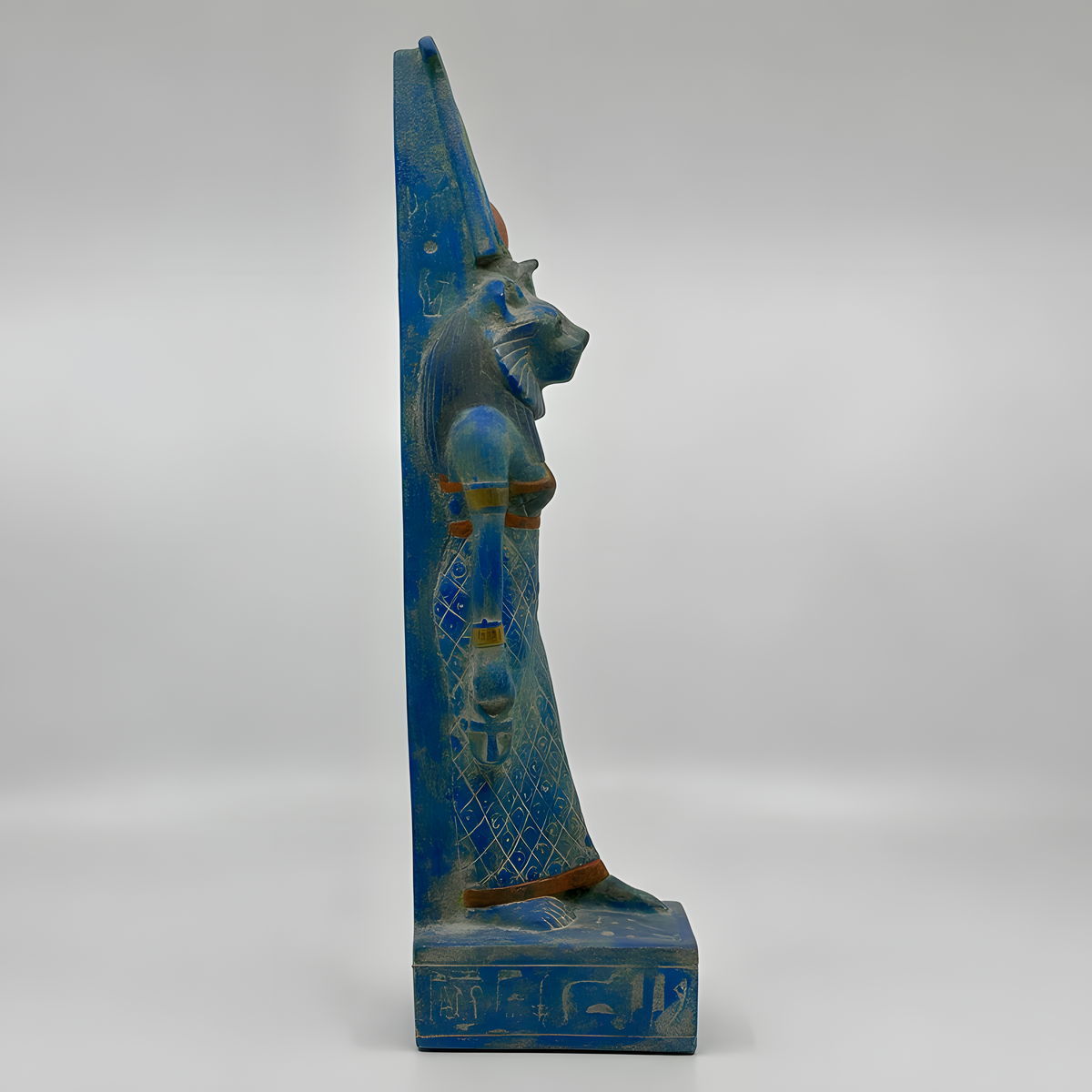 Sekhmet statue in blue stone, museum reproduction, lioness head detail