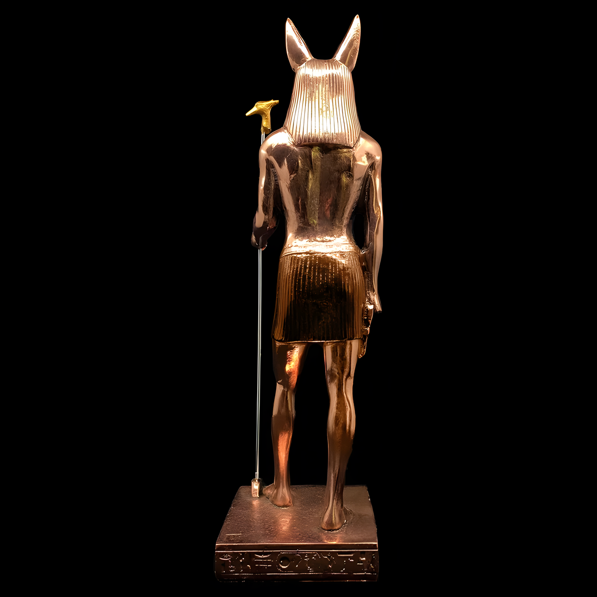 Close-up of the copper Anubis statue's jackal head, museum reproduction