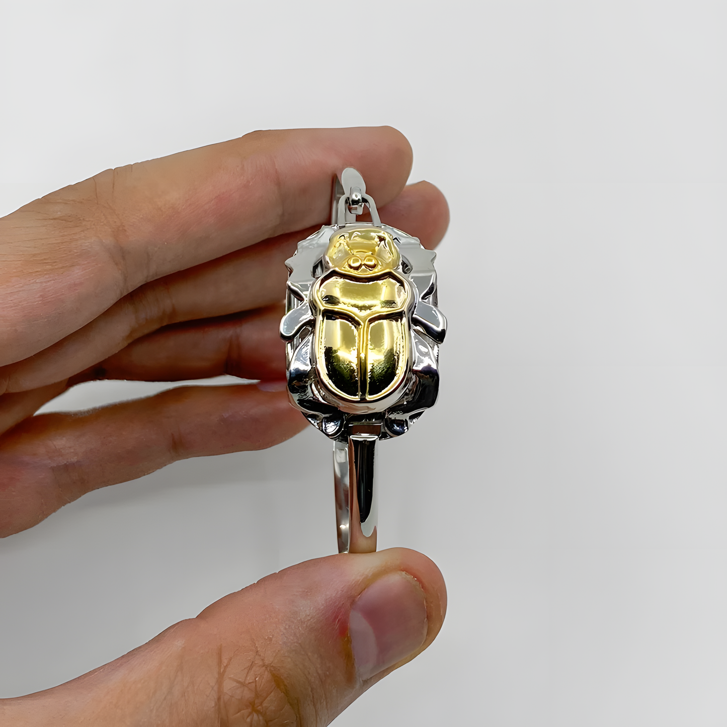 Close-up of the Isis charm on the handmade Egyptian brass bracelet