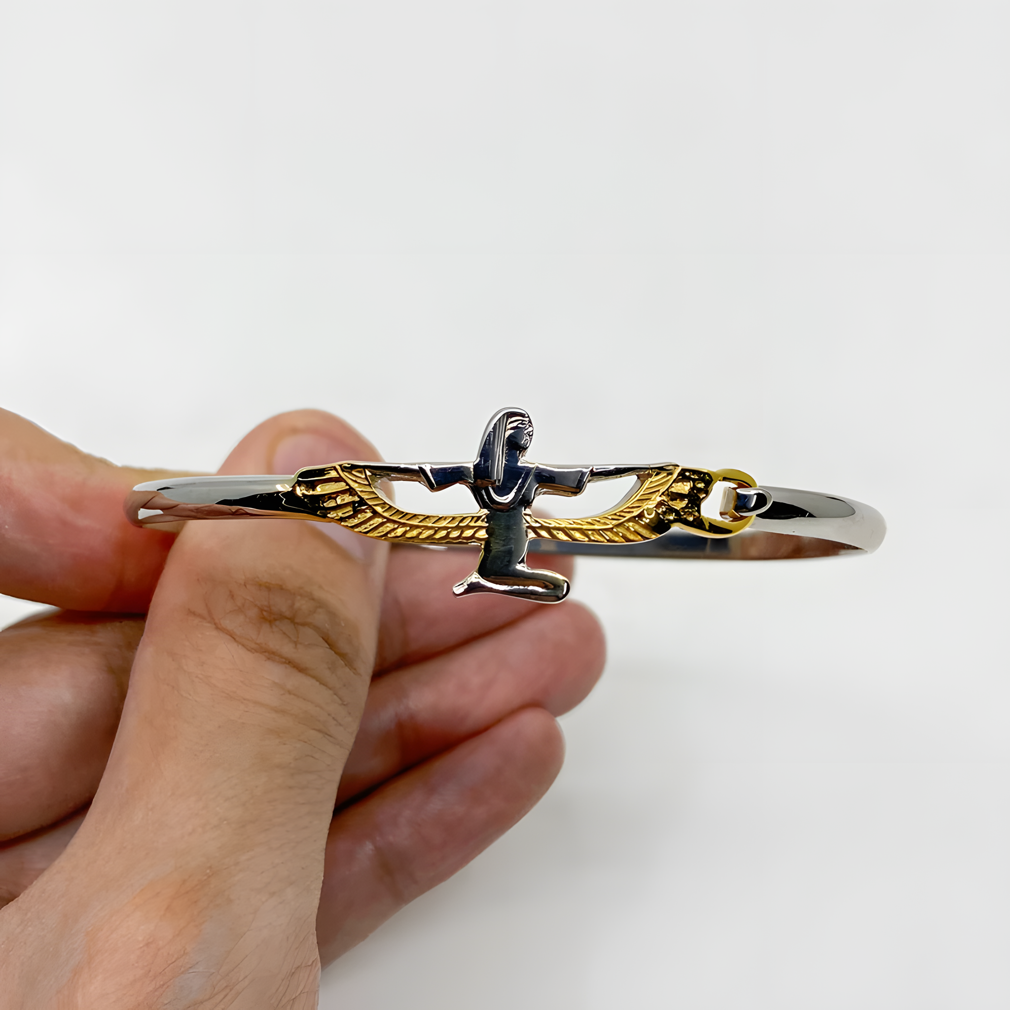 Close-up of the cartouche charm on the handmade Egyptian brass bracelet