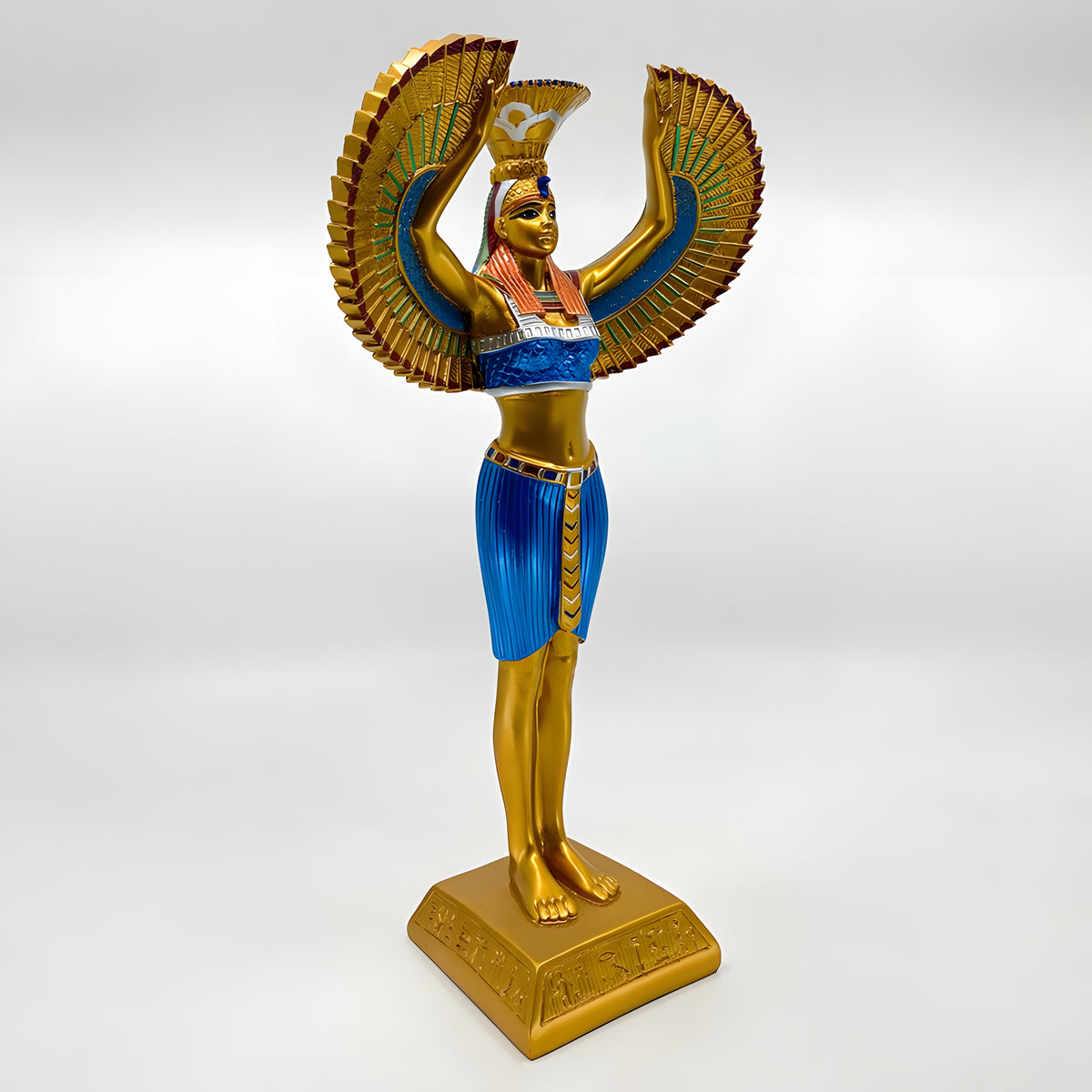 Black and gold Isis statue, museum reproduction, close-up of face and headdress