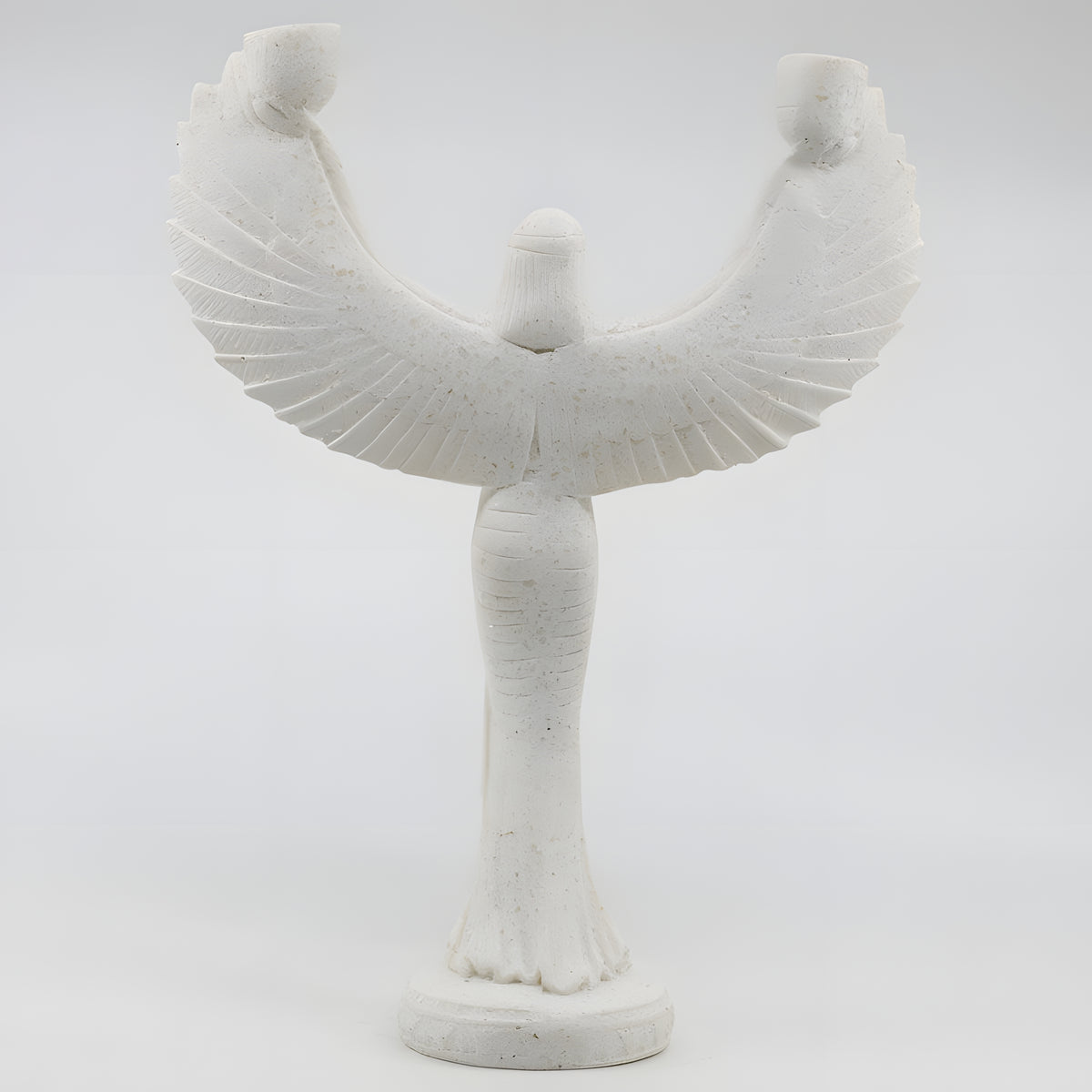 Alabaster Isis candle holder statue, museum reproduction, close-up of carved face