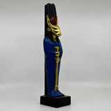 Hathor statue with gold-leaf finish, museum reproduction, side profile view