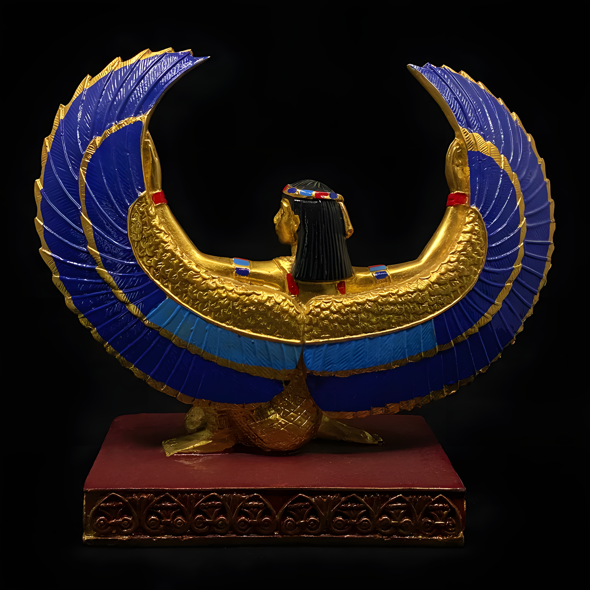 Golden winged Isis statue, museum reproduction, side profile view