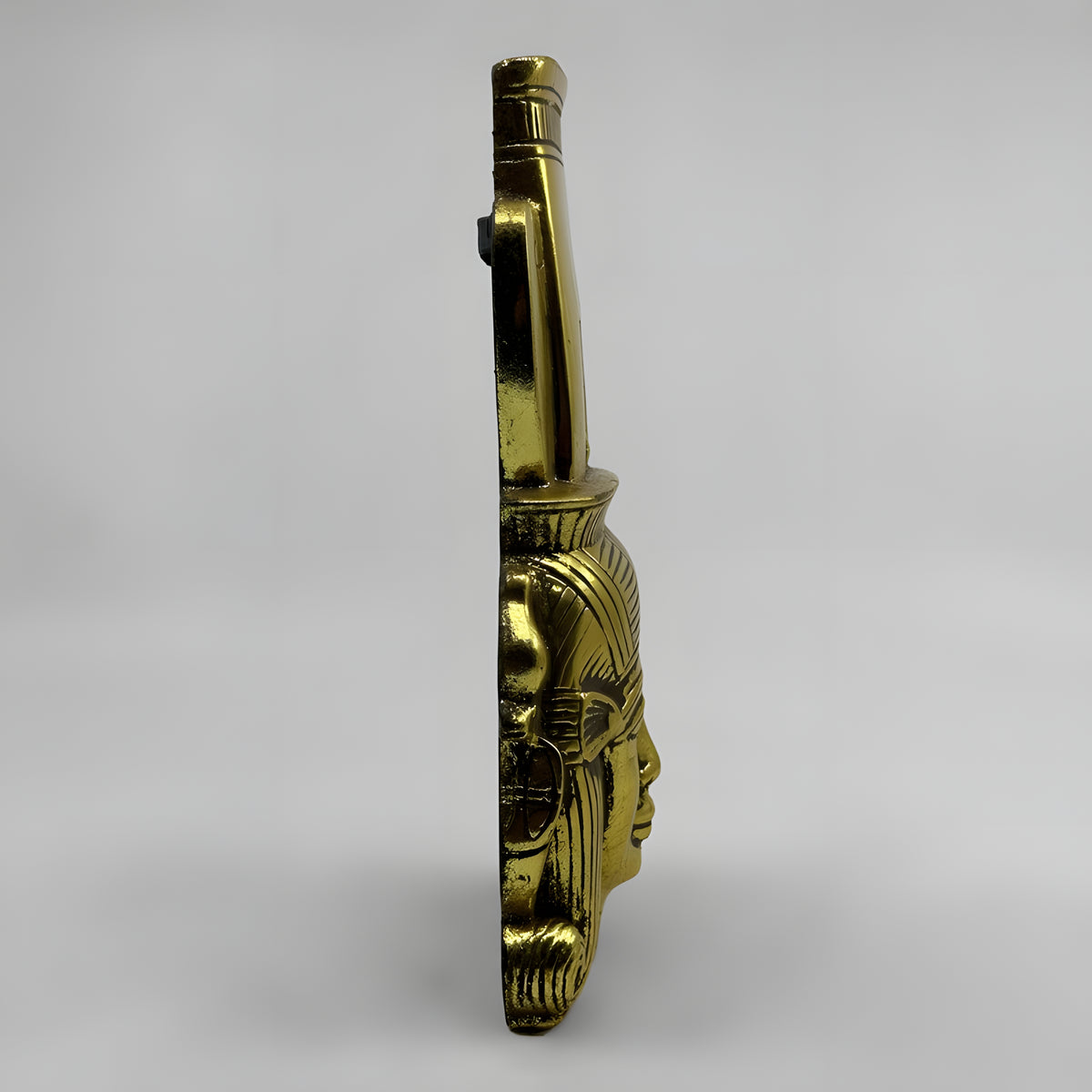 Hathor face wall sculpture, museum reproduction, side/detail view