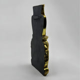 Hathor face wall sculpture, museum reproduction, angled view