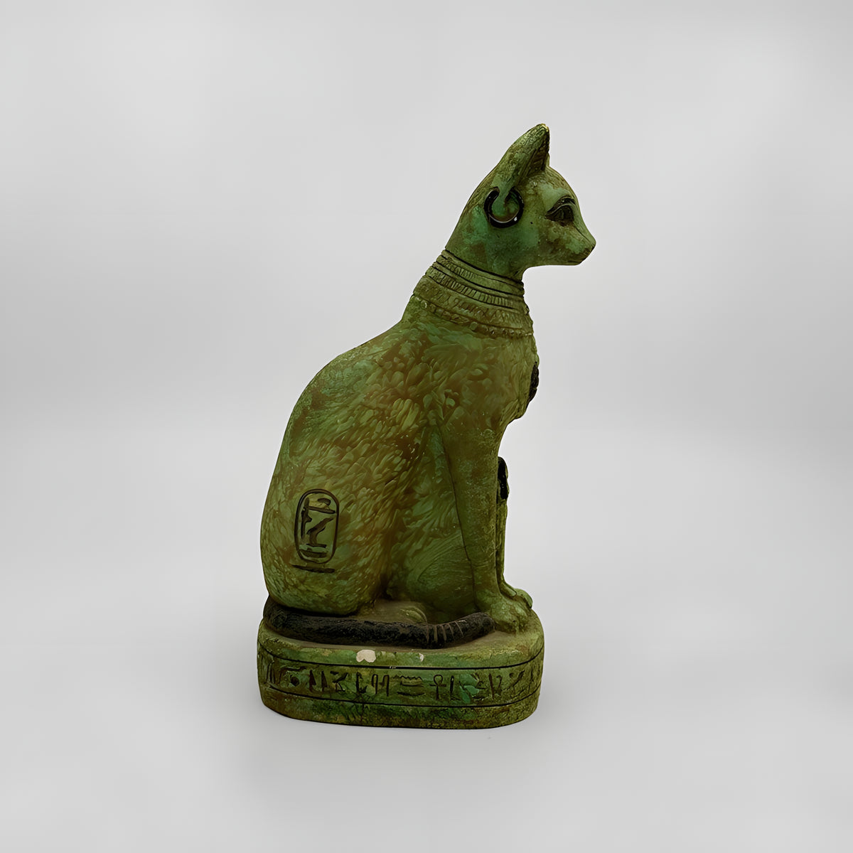 Green Bastet statue museum reproduction, side profile view