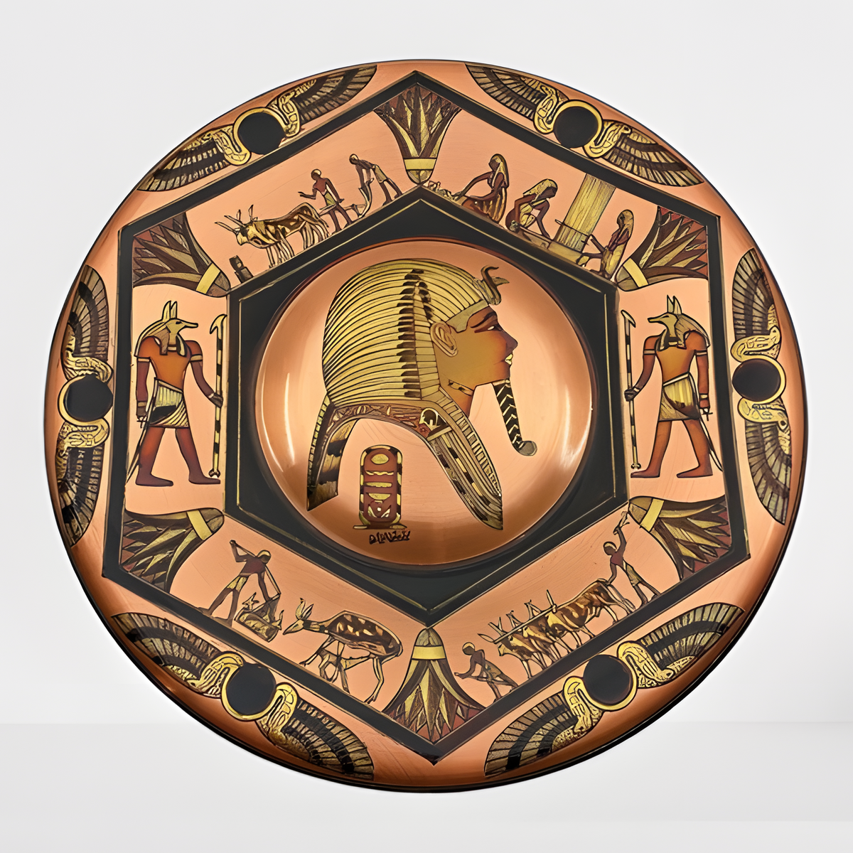 Angled view of the handmade copper Tutankhamun and Anubis wall art museum reproduction
