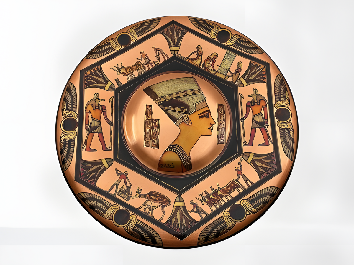 Handmade Egyptian copper wall plate featuring Queen Nefertiti and Anubis relief, front view