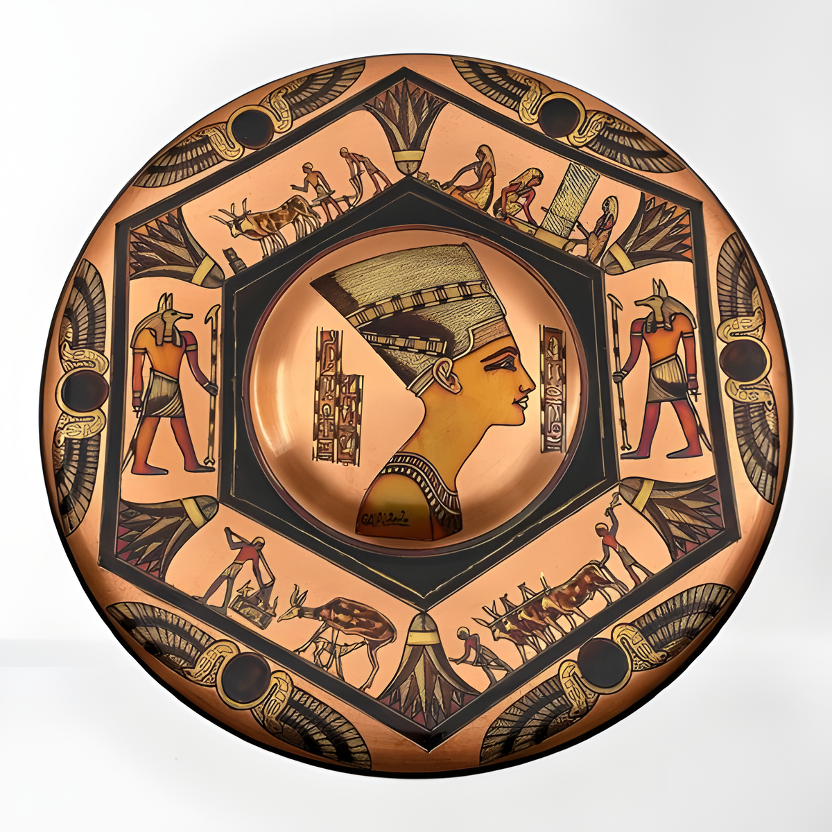 Handmade Egyptian copper wall plate featuring Queen Nefertiti and Anubis relief, angled view