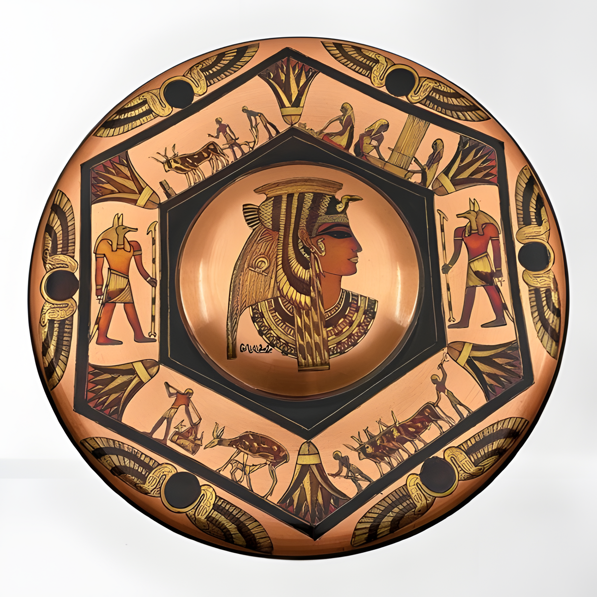 Close-up of hieroglyphic detailing on the Cleopatra and Anubis copper wall plate