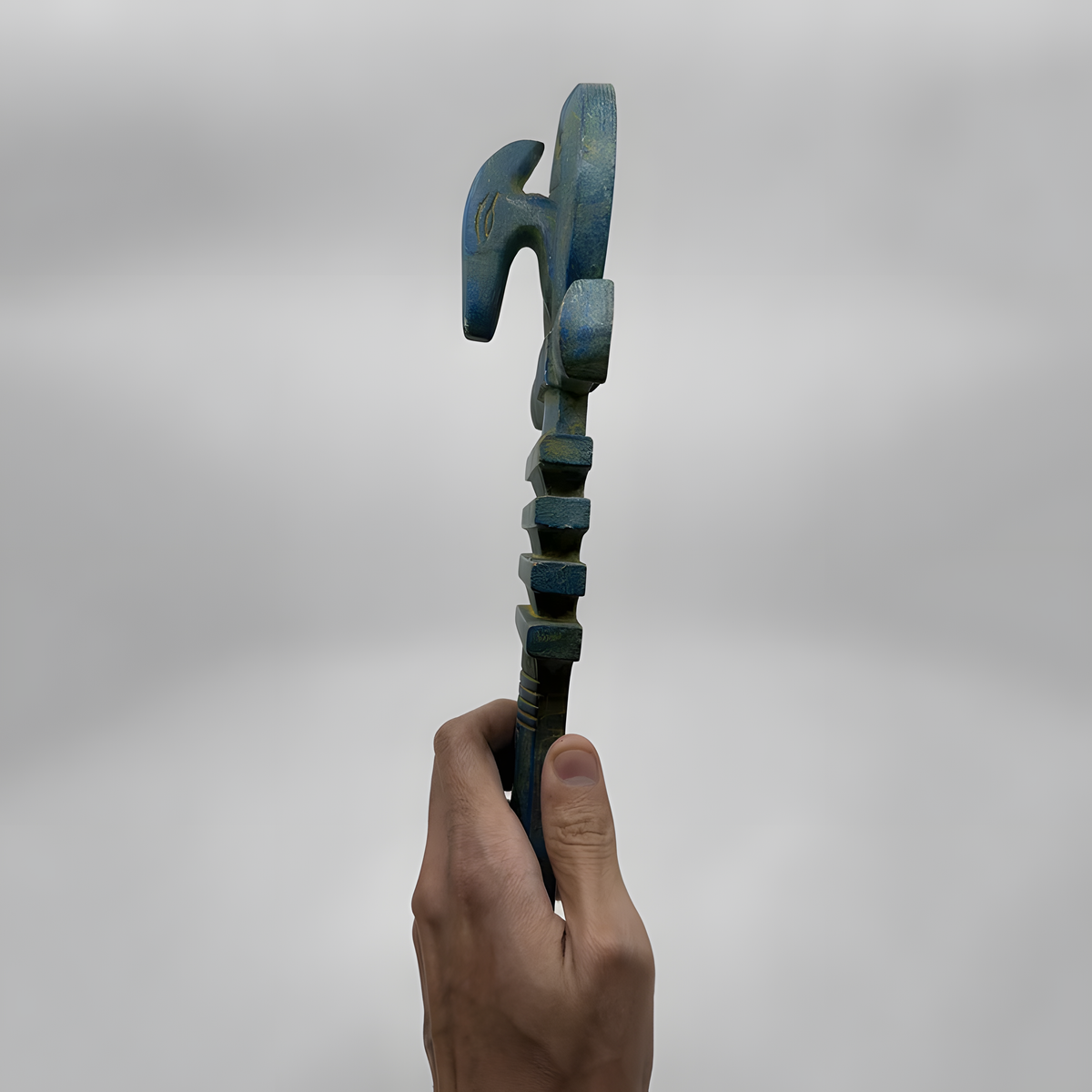 Blue stone Egyptian Ankh statue, museum reproduction, angled view