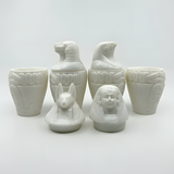 Alabaster canopic jars set, museum reproduction — detail of Imsety and Hapy jar lids