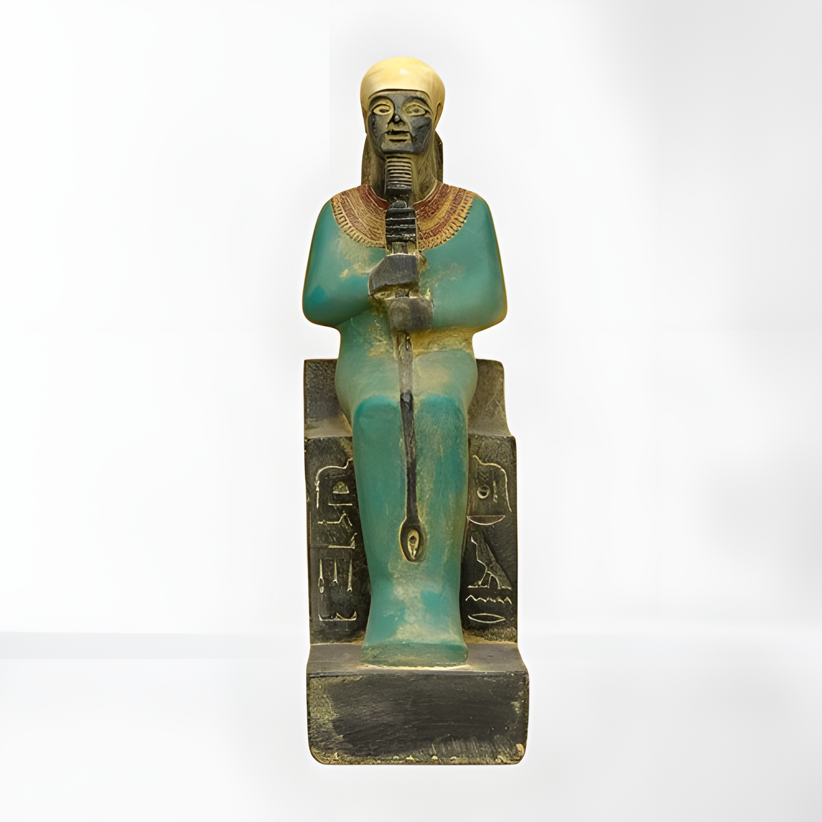 Ptah statue, museum reproduction — seated sculpture on throne, front view