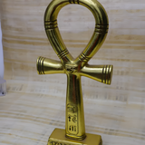 Gold-tone Egyptian Ankh statue, museum reproduction, angled view