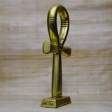 Gold-tone Egyptian Ankh statue, museum reproduction, close-up detail