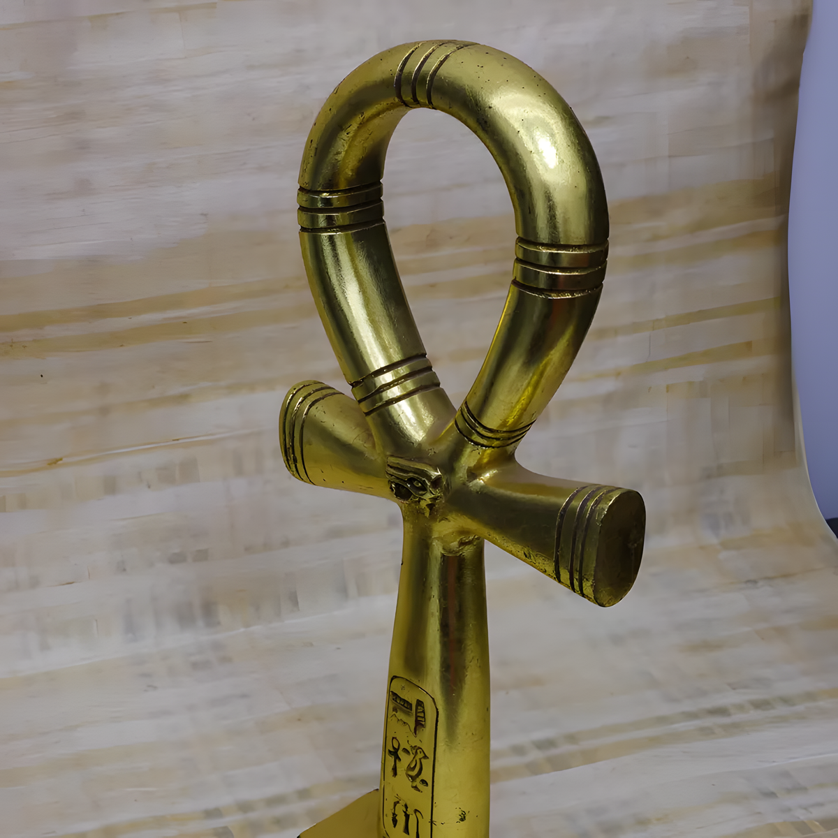 Gold-tone Egyptian Ankh statue, museum reproduction, size reference