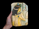 Hand-carved Cleopatra bas-relief stone tablet, museum reproduction