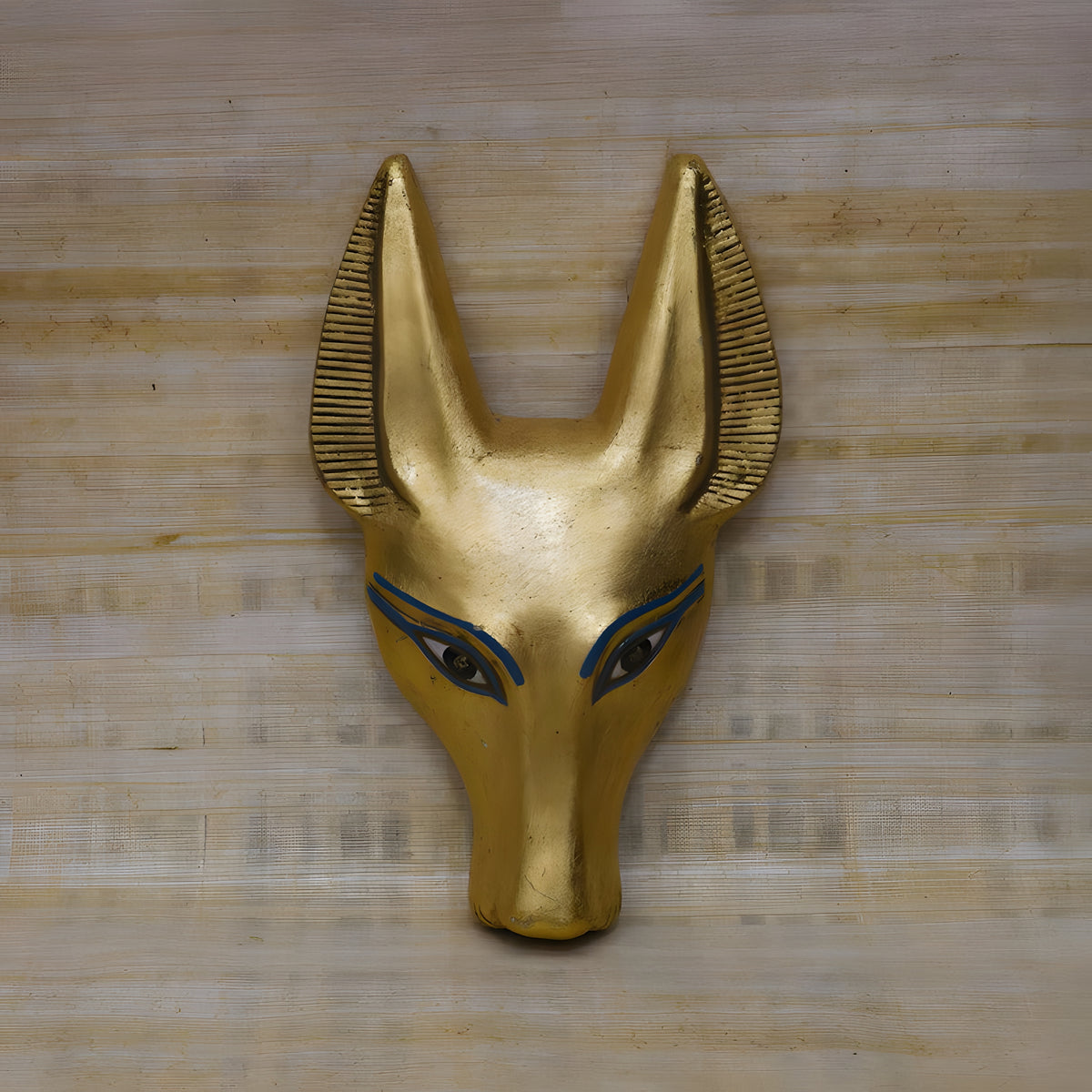 Side profile view of the handmade Anubis wall sculpture museum reproduction