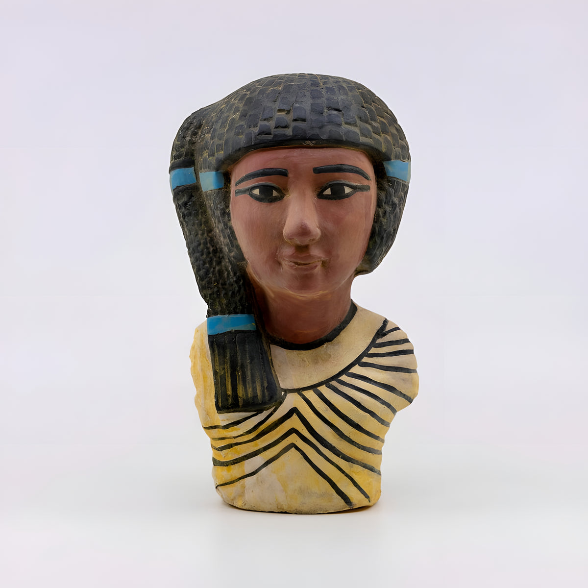 Hand-carved stone bust of Queen Meritaten, Amarna Period museum reproduction, front view