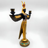 Winged Isis candle holder statue, museum reproduction — side view