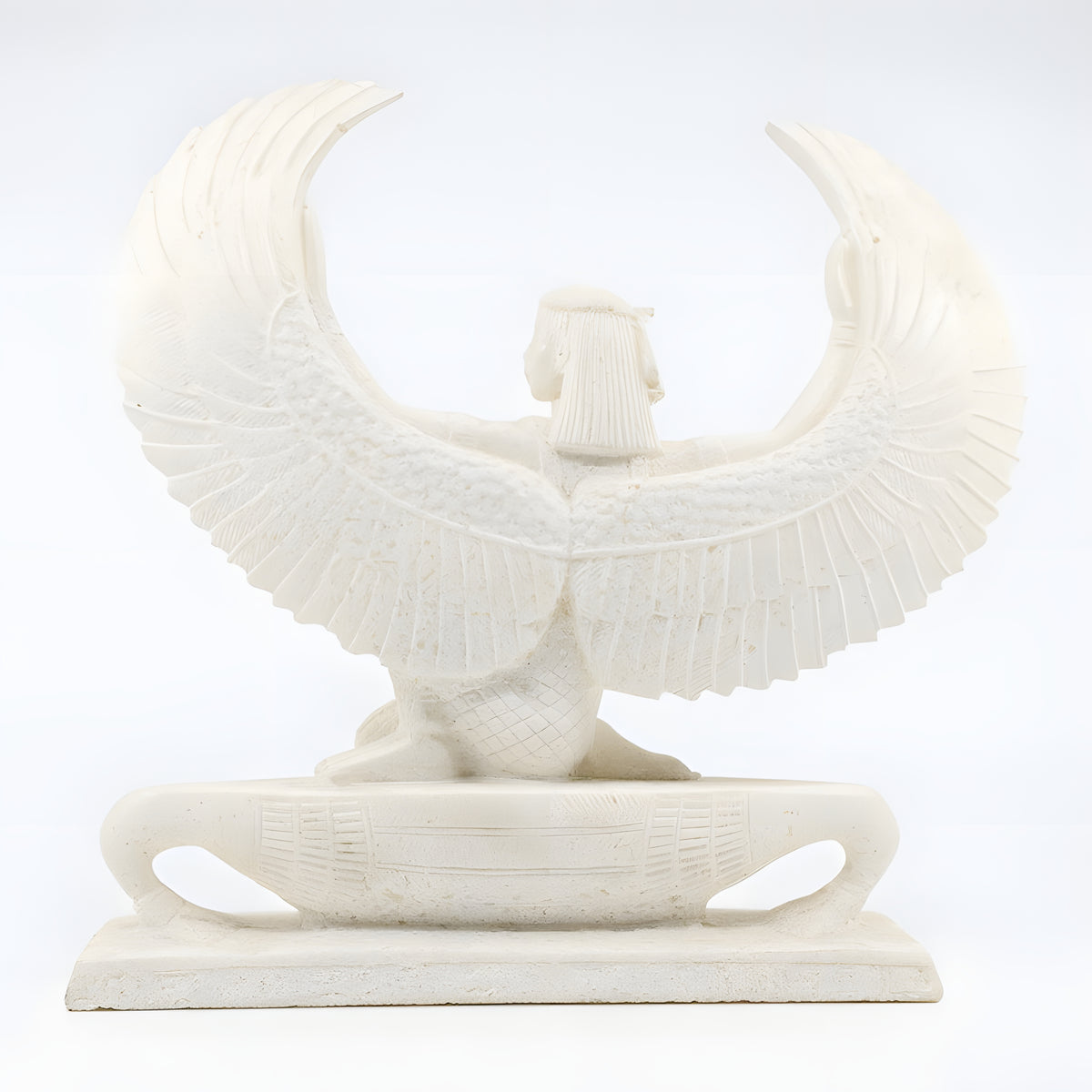 Alabaster Isis statue, museum reproduction — angled view showing carved detail