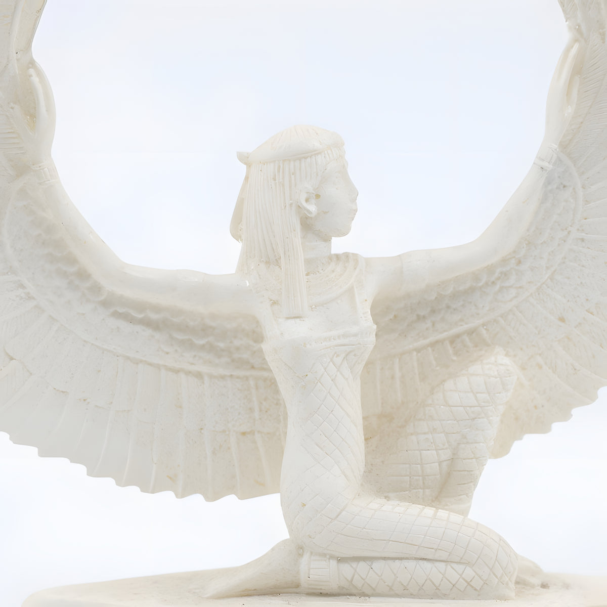 Alabaster Isis statue, museum reproduction — side view of the sculpture