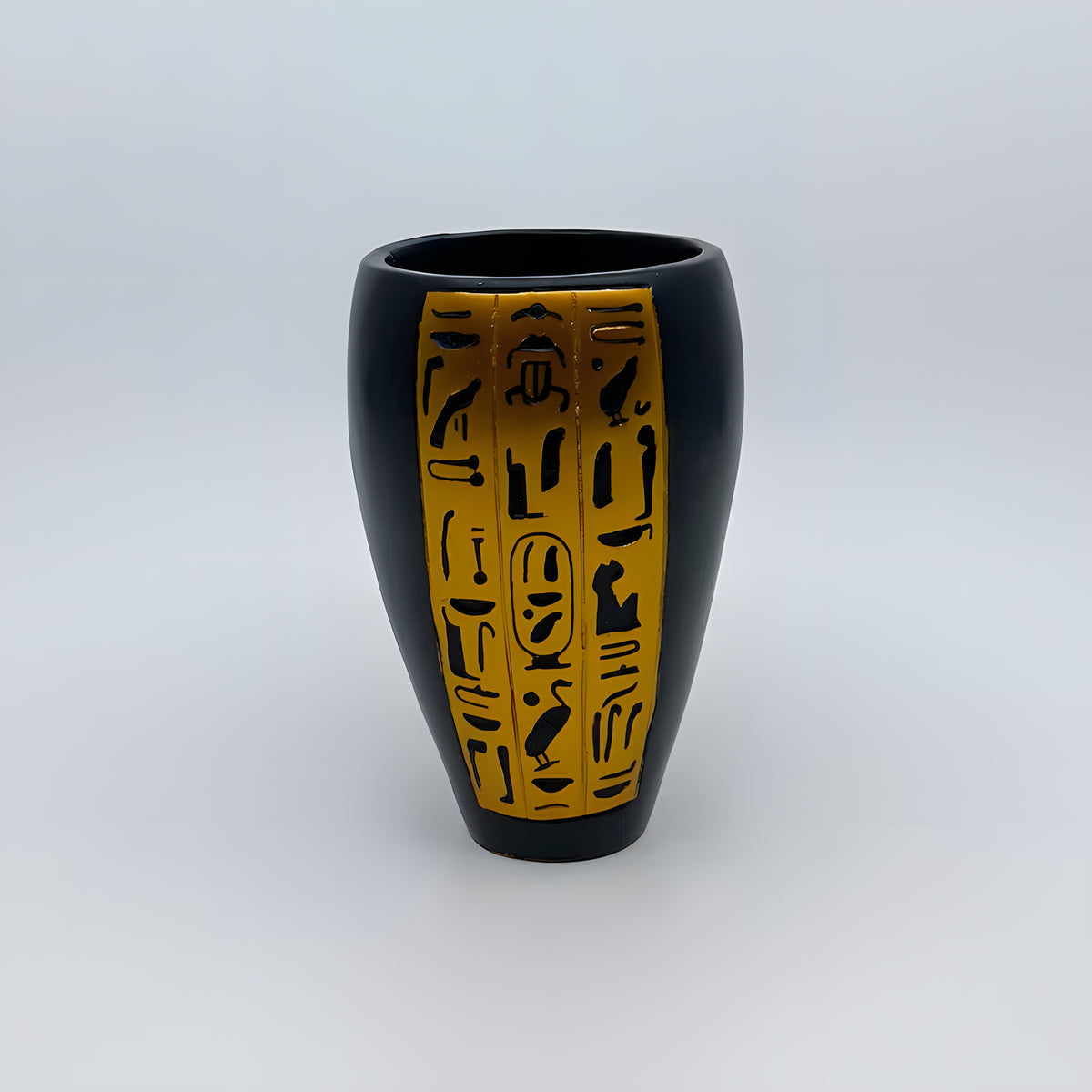 Polystone canopic jar set, museum reproduction — detail of Imsety and Hapy jar lids