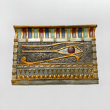 Egyptian tissue box detail showing Eye of Horus and winged sun motif
