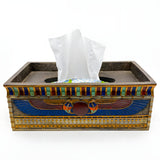 Egyptian winged sun tissue box shown from an angle on display