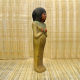 Egyptian Isis goddess statue, museum reproduction — angled view showing carved detail
