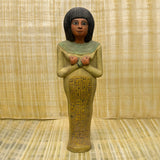 Egyptian Isis goddess statue, museum reproduction — side view of the sculpture