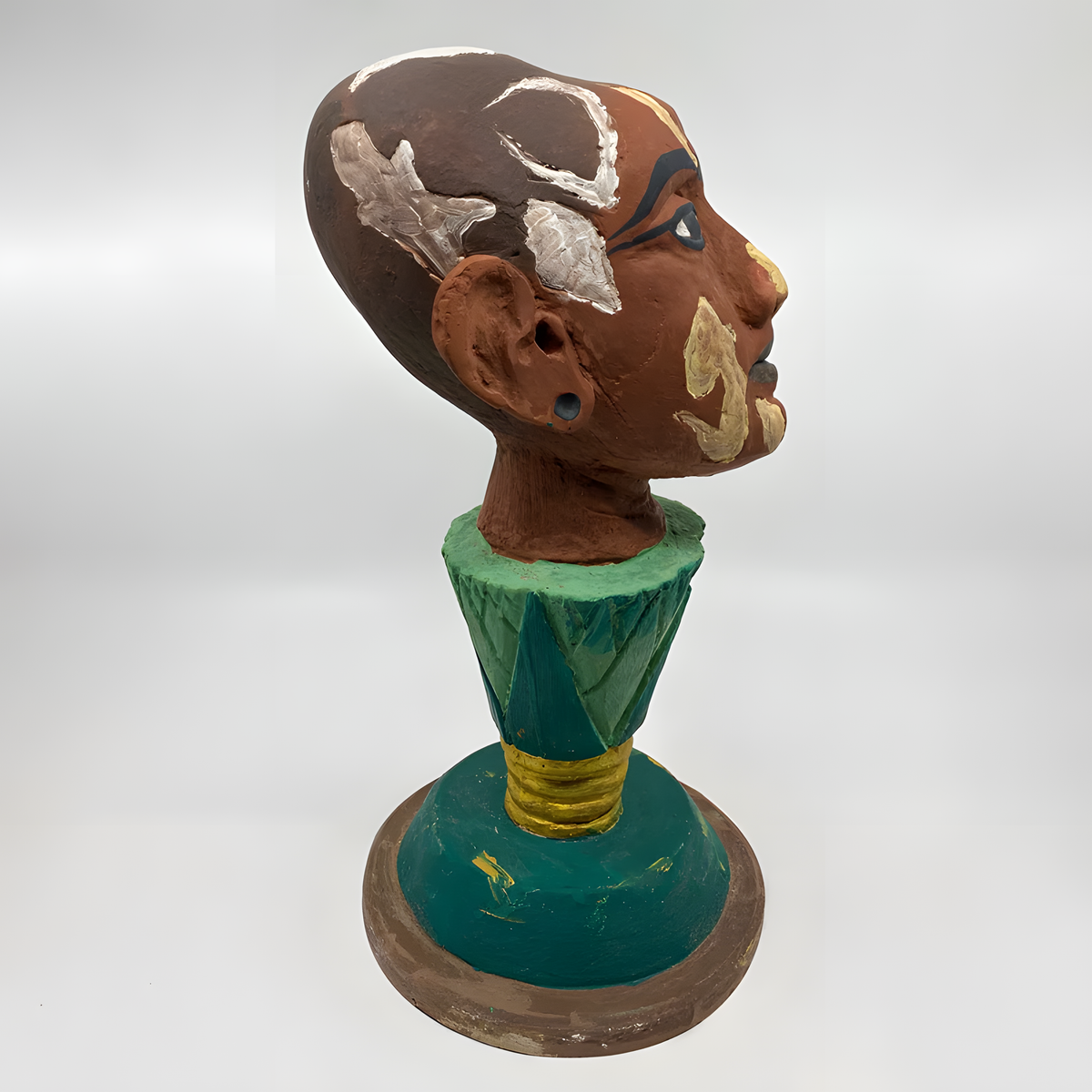 Side view of the Nefertem lotus head bust museum reproduction, handmade in Egypt