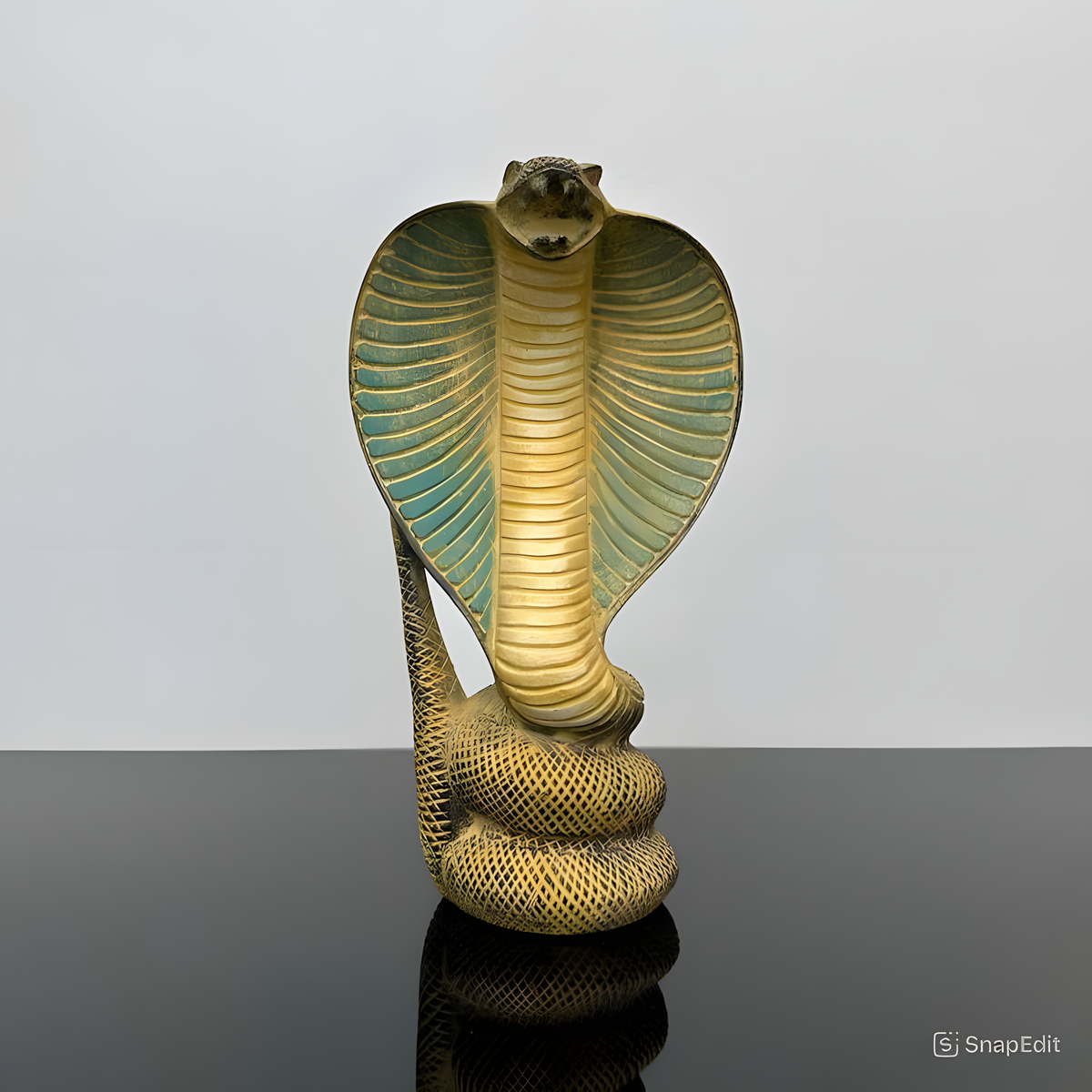 Handmade stone uraeus cobra statue, museum reproduction — front view