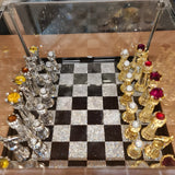 Asfour crystal chess set with 24k gold-plated pieces on a sparkling crystal board