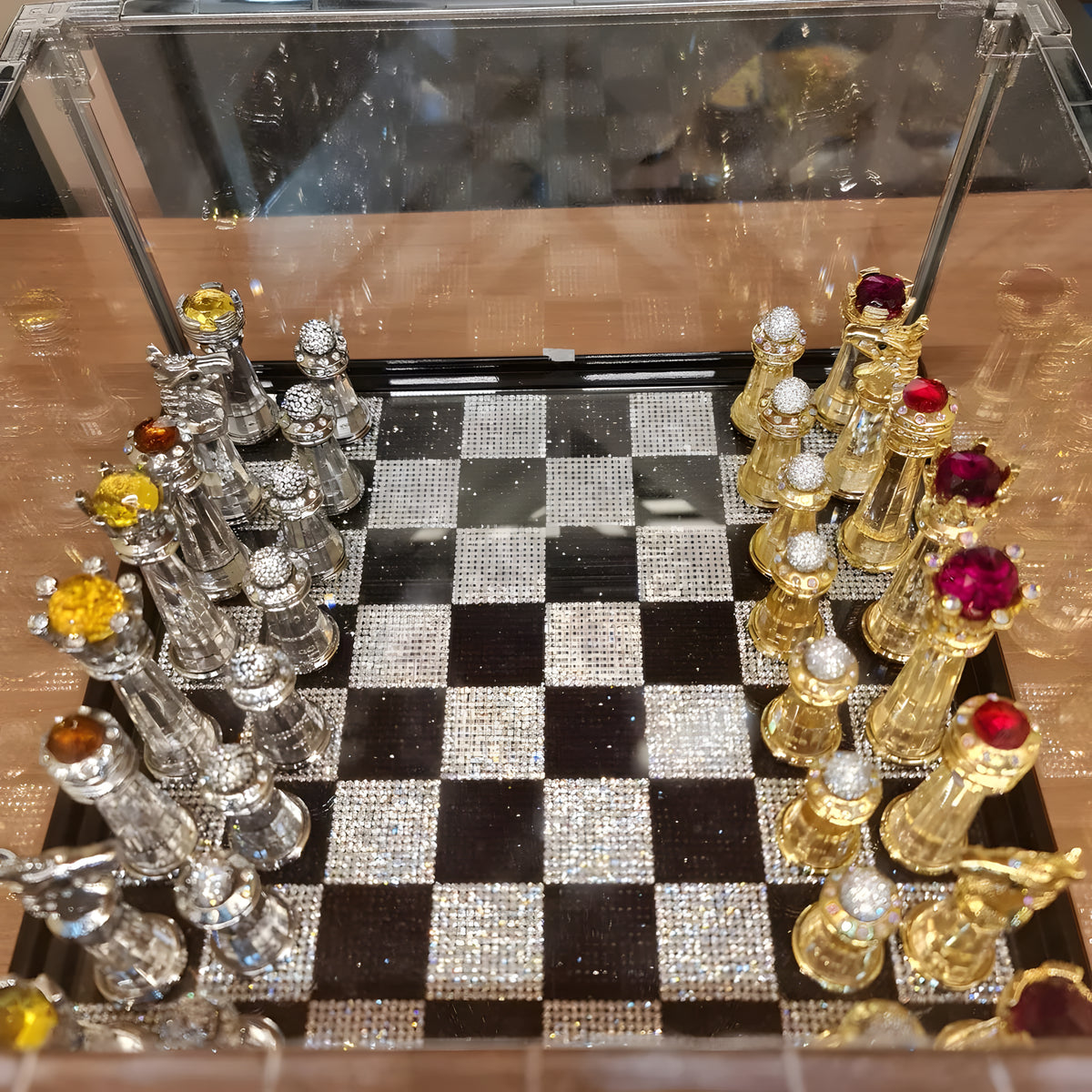 Asfour crystal chess set with 24k gold-plated pieces on a sparkling crystal board