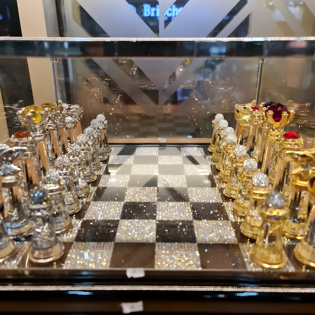 Detail of the velvet-finished base and royal blue velvet storage box of the crystal chess set